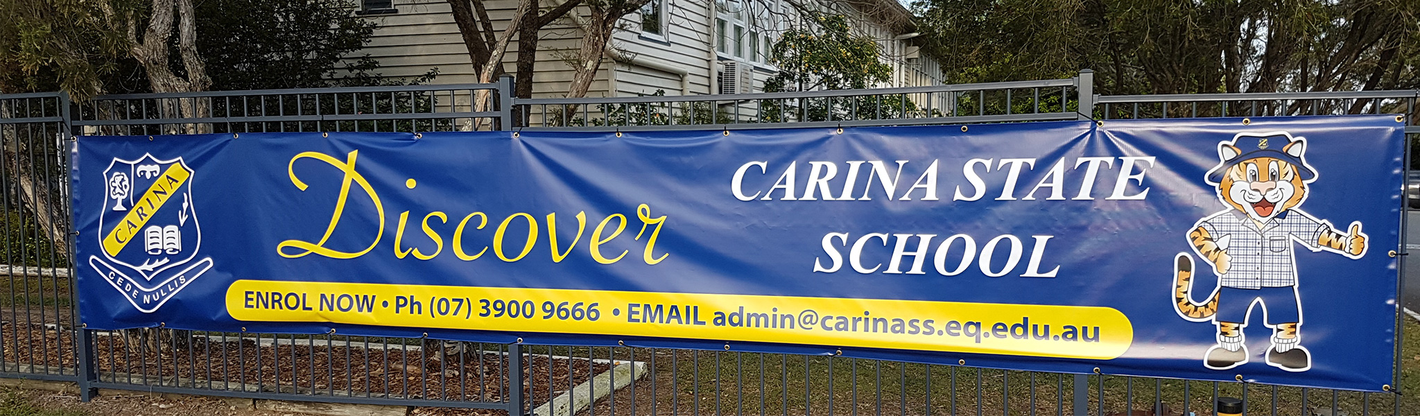 school banner on fence